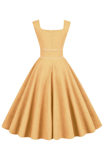 Vestido de cuello cuadrado amarillo de la década de 1950